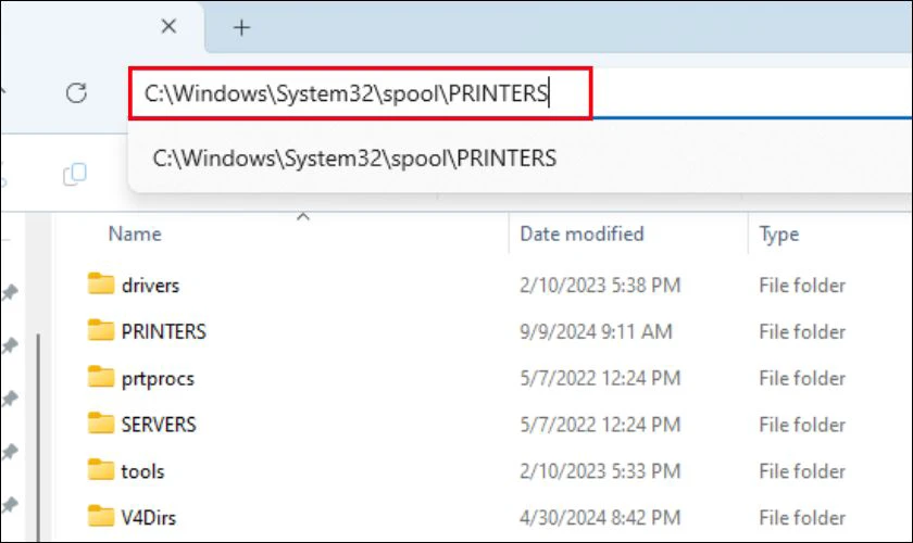Tiếp theo, mở File Explorer và truy cập theo đường dẫn: C:\Windows\System32\spool\PRINTERS, xóa toàn bộ các tệp tin có trong thư mục PRINTERS