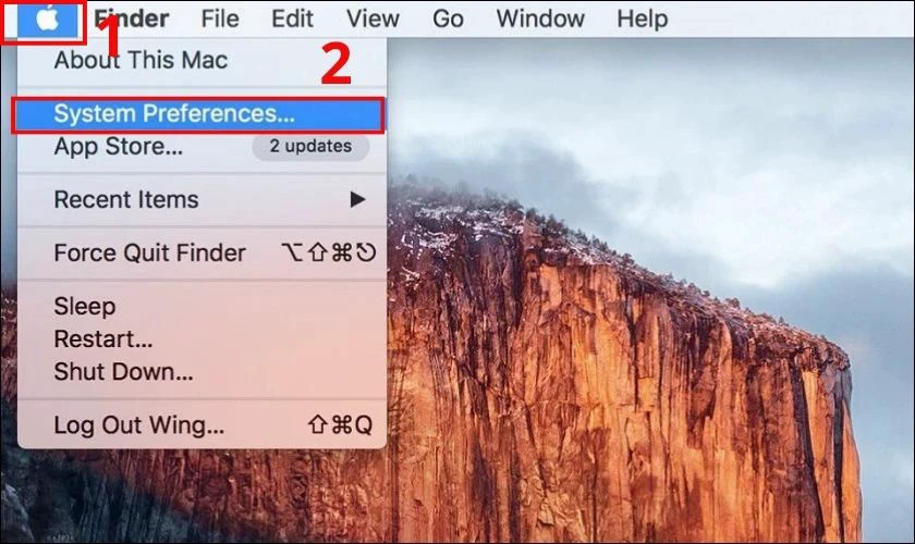 Nhấn chuột vào logo Apple và nhấn vào System Preferences