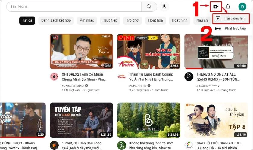 Nhấn vào biểu tượng máy quay ở góc phải trên cùng và chọn Tải video lên