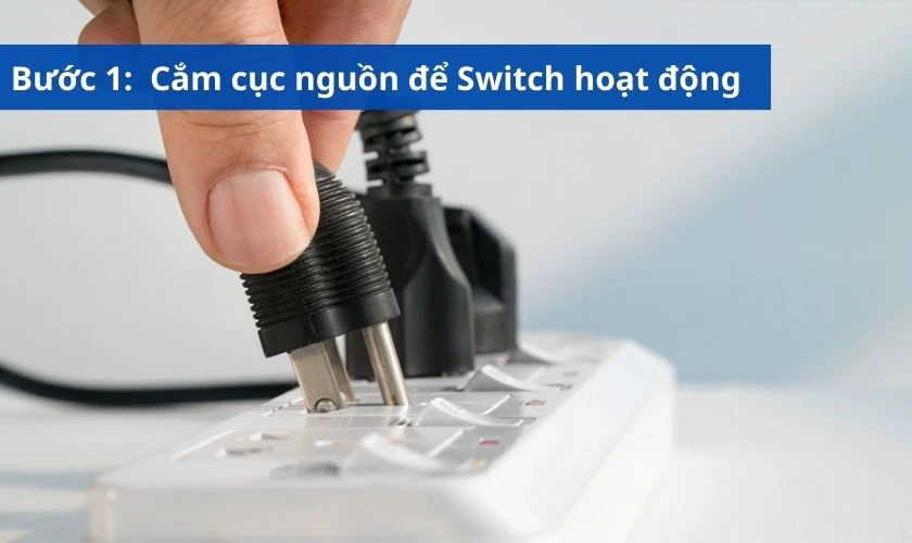 Cắm cục nguồn của vào ổ điện và cắm vào Switch