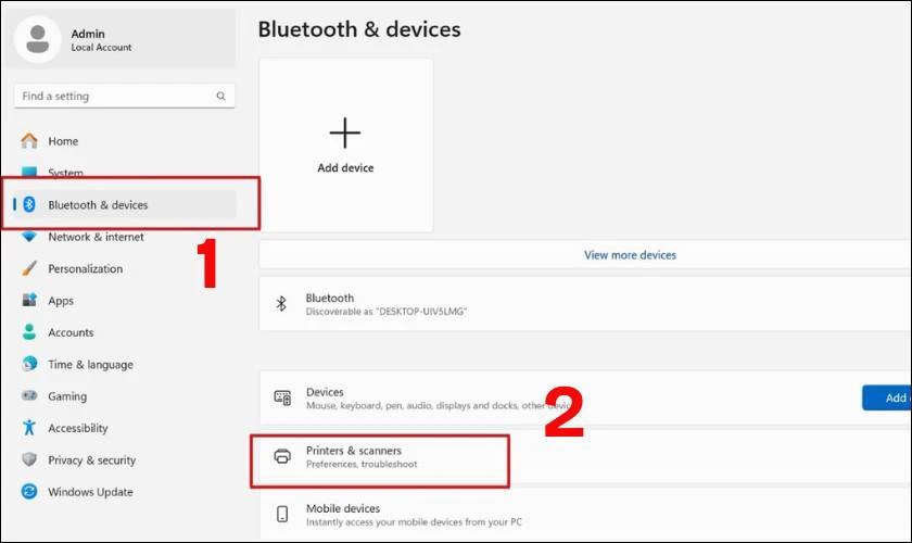 Kế đến bạn hãy truy cập Bluetooth and devices, sau đó chọn Printers & scanners