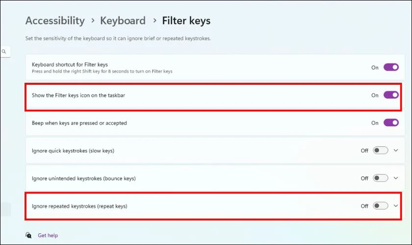 Bỏ chọn ô Show the Filter Keys icon on the taskbar và Ignore repeated keystrokes (repeat keys)