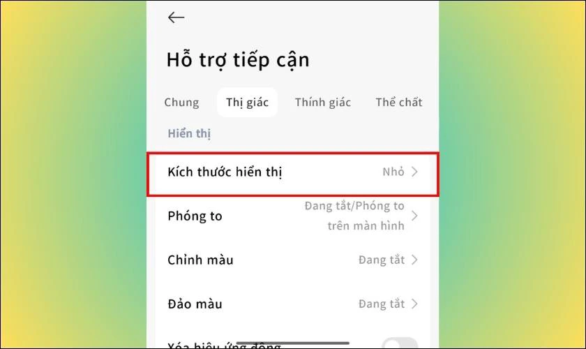 Trong phần Thị giác hãy tìm và chọn Kích thước hiển thị