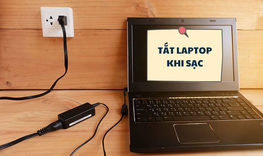 Tắt hẳn laptop khi sạc pin