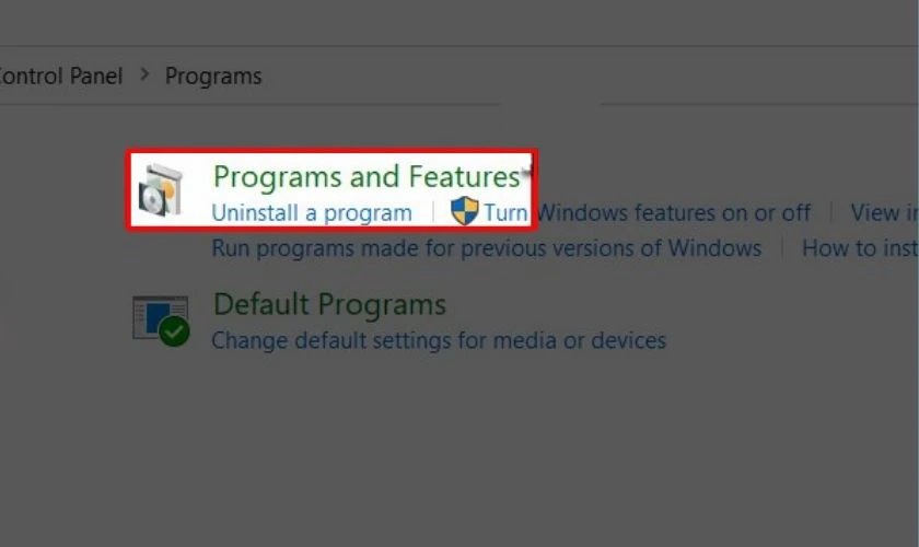 Nhấn chọn vào mục Programs and Features