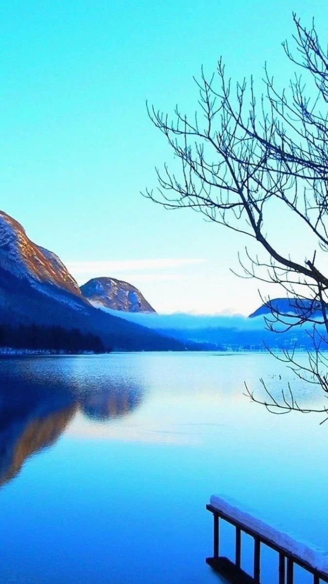 Wallpaper iOS 26.3 chủ đề phong cảnh cho iPhone