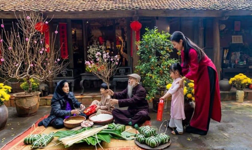 Hình máy tính quây quần gói bánh chưng ấn tượng