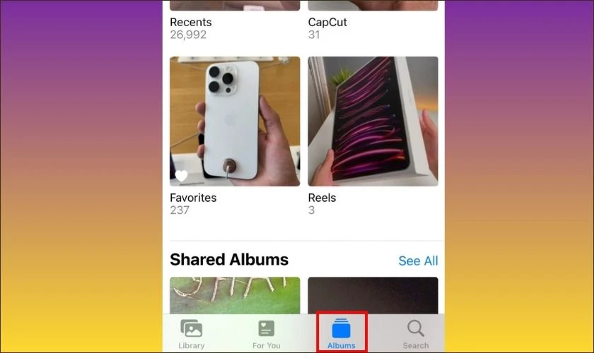 Nhấn vào tab Album ở thanh điều hướng dưới cùng