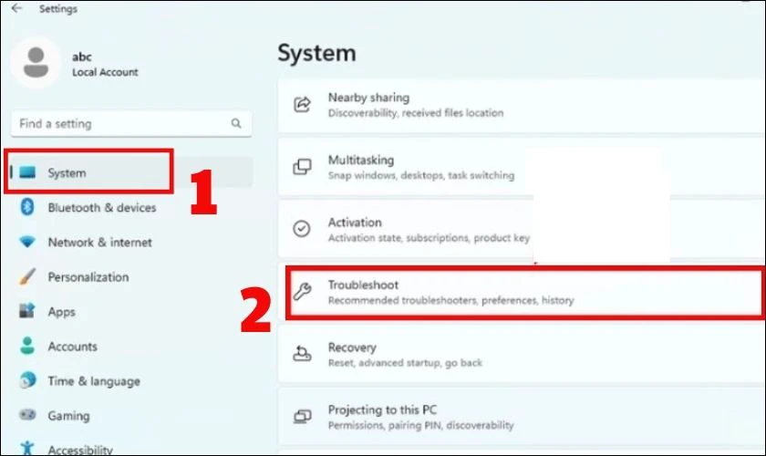 Lúc này, tại mục System, bạn nhấn vào Troubleshoot