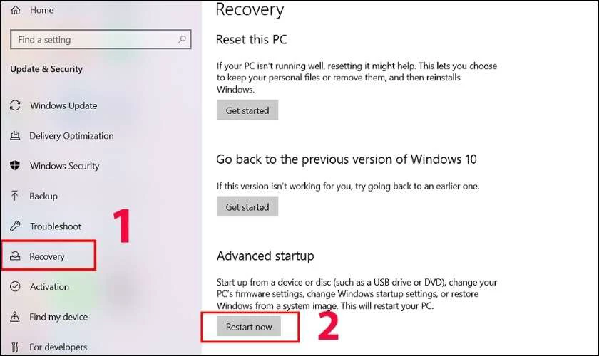 Chọn Recovery, sau đó nhấn Restart now