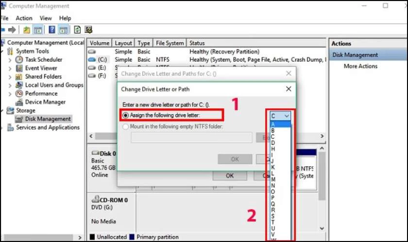 Tại dòng Assign the following drive letter: Chọn 1 ký tự để máy tính có thể nhận ổ cứng thứ 2