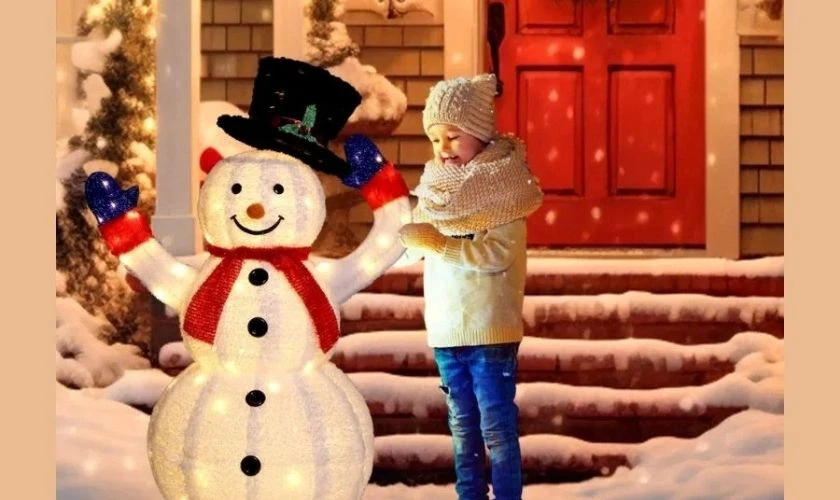 Cách tạo dáng chụp ảnh Noel với người Tuyết