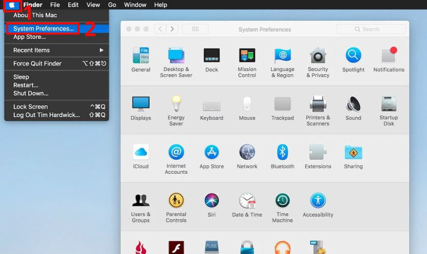 Nhấn vào biểu tượng táo khuyết, sau đó vào System Preferences