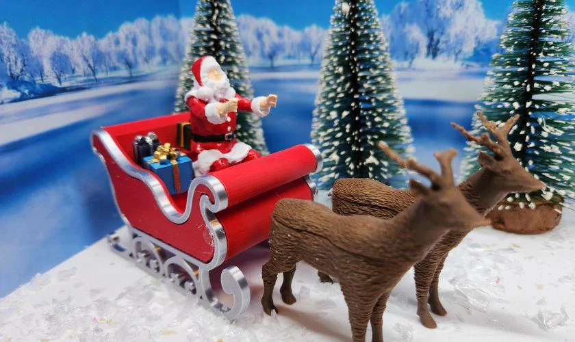 Trang trí Noel văn phòng bằng mô hình xe tuần lộc chở quà