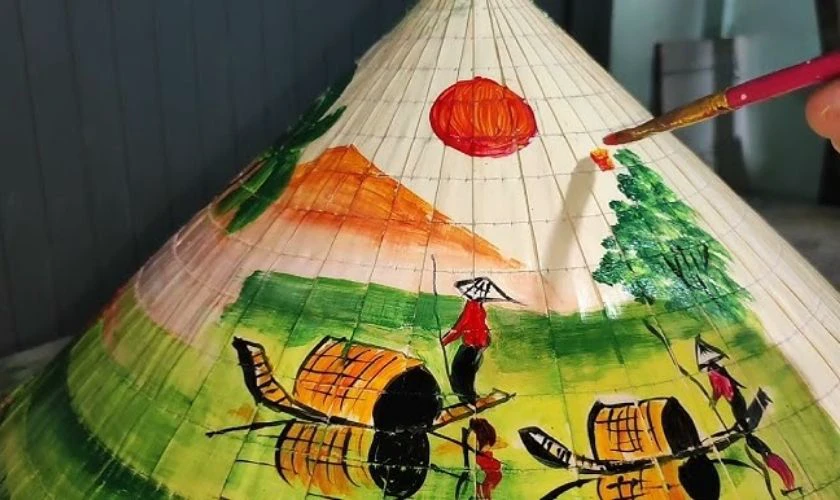 Vẽ tranh lái đò trang trí nón lá