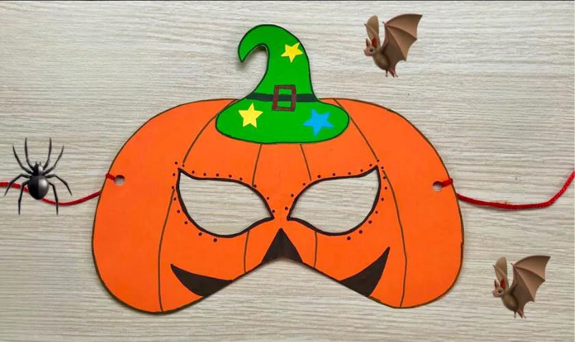 Làm mặt nạ Halloween bằng giấy hình bí ngô