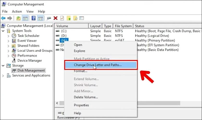 Chọn Change Drive Letter and Paths và thực hiện đặt tên ổ cứng ngoài