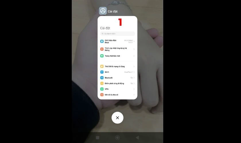 Tìm và mở ứng dụng Cài đặt trên điện thoại Xiaomi của bạn