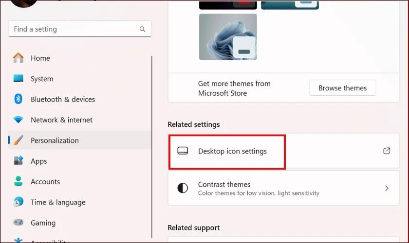 T&igrave;m mục Related settings v&agrave; chọn Desktop icon settings