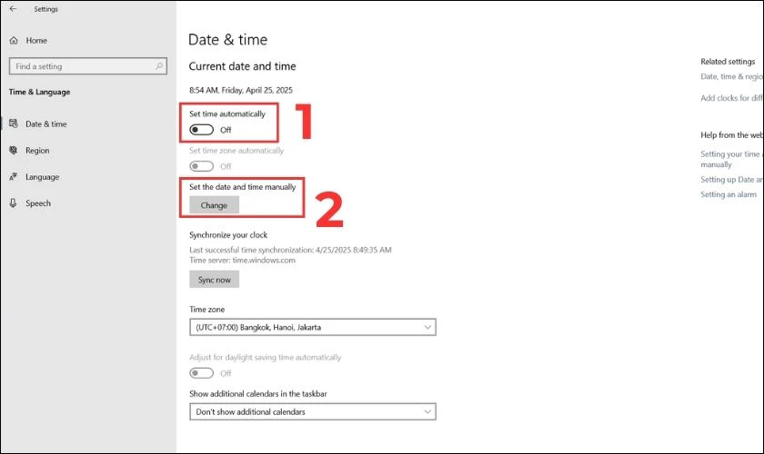Chọn nút Change (Thay đổi) ở mục Set the date and time manually