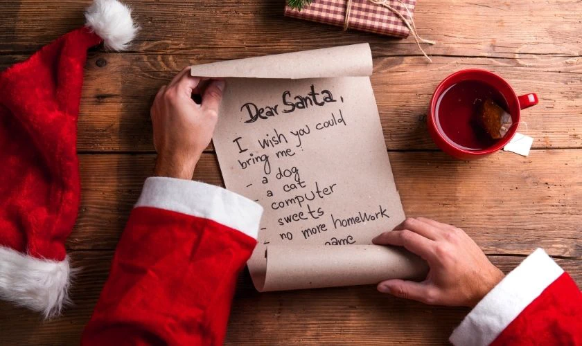 &Ocirc;ng gi&agrave; Noel đọc điều ước