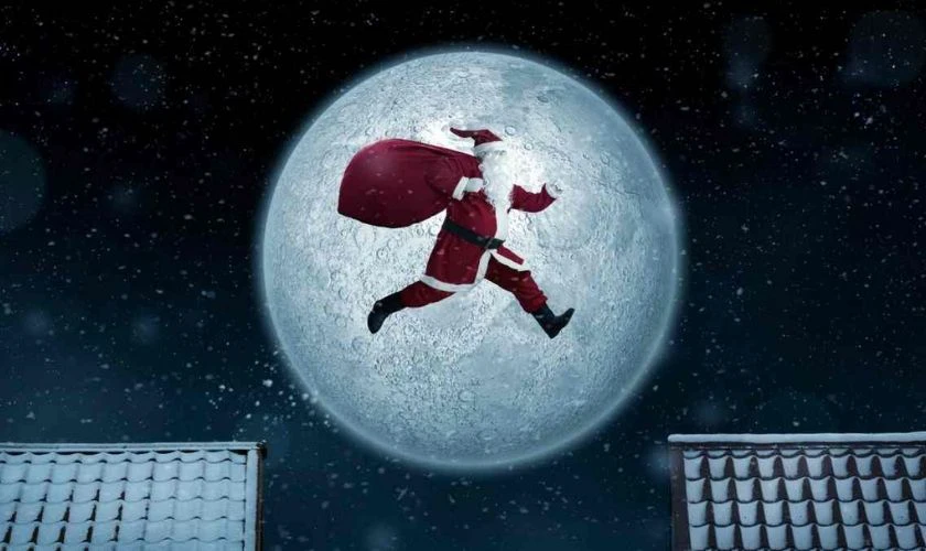 &Ocirc;ng gi&agrave; Noel ph&aacute;t qu&agrave; trong đ&ecirc;m