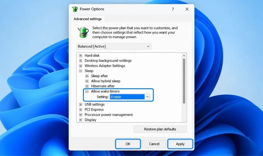 Mở Sleep > Allow wake timers, chọn Enable rồi nhấn Apply > OK