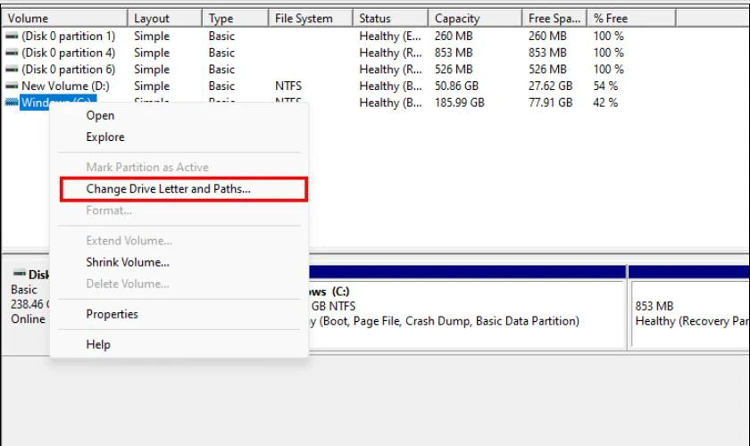 Nhấn chuột phải vào ổ đĩa bị lỗi, chọn Change Drive Letter and Paths…
