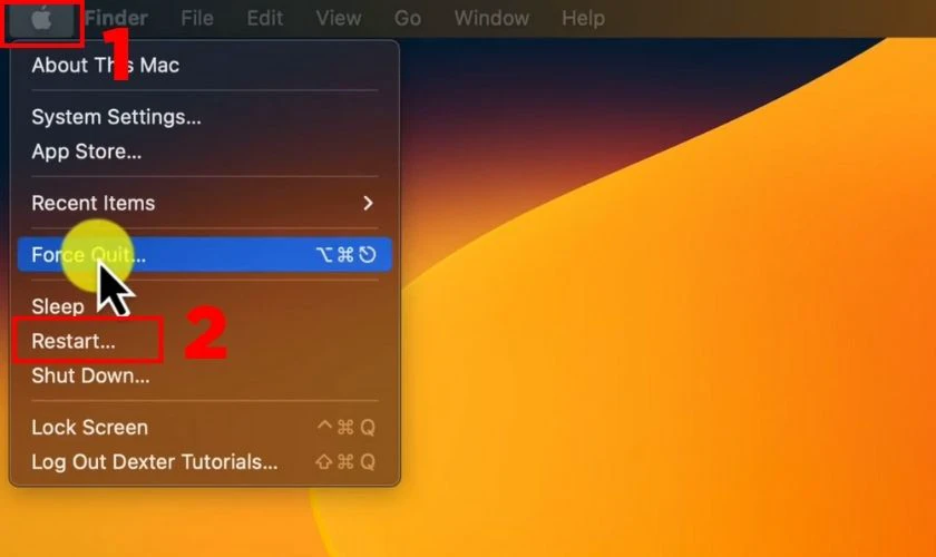 Nhấn vào biểu tượng Apple ở góc trên bên trái màn hình rồi chọn Restart
