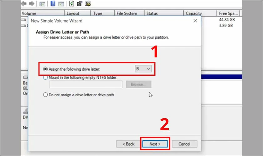 T&ugrave;y chọn chữ c&aacute;i tại mục Assign the following drive letter rồi bấm Next
